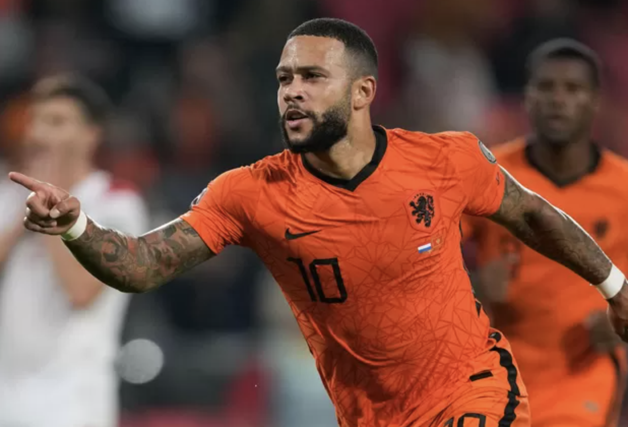 Memphis Depay wears dodgy jacket and smokes cigar as he dedicates